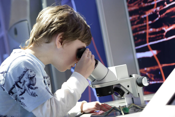 Child with microscope - Photo, image