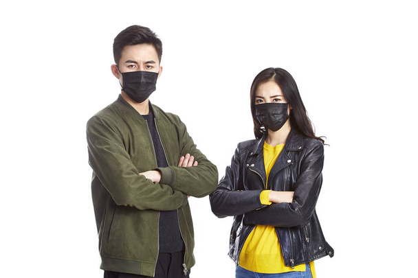 Asya çift giyen siyah maske - Fotoğraf, Görsel
