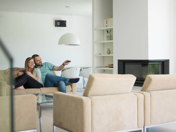 couple relaxes in the living room - Photo, image