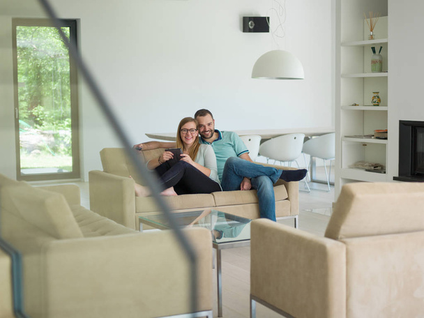 couple relaxes in the living room - Foto, imagen