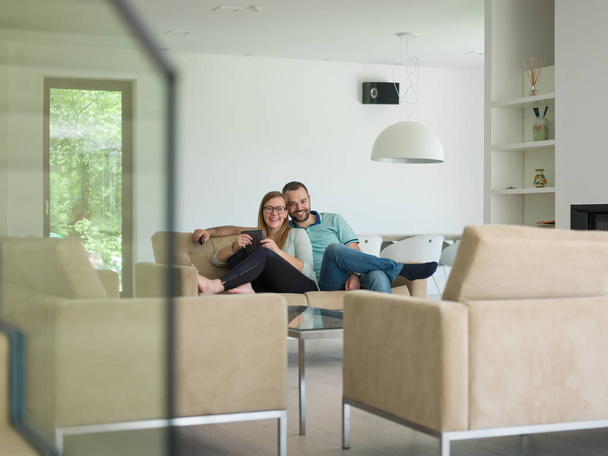 couple relaxes in the living room - Photo, image