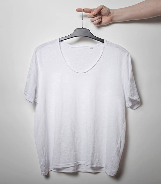 Blank t-shirt on white background - Foto, Imagem
