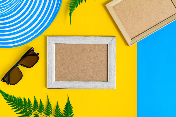 Wooden picture frame and set object vacation relax on colorful p - Photo, Image