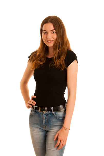 attractive young woman in jeans and black t shirt isolated over  - Foto, Imagem