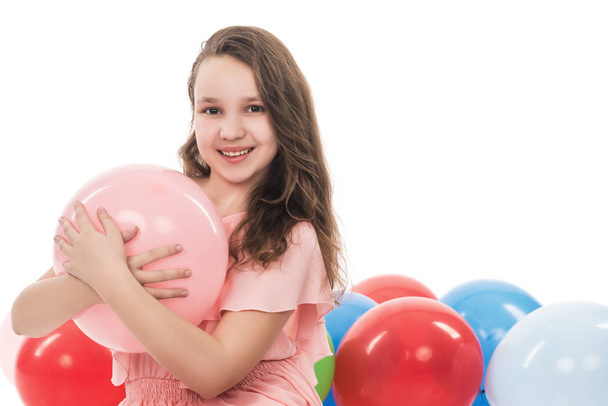 portrait of smiling teenage girl with balloons, isolated on whit - Foto, imagen