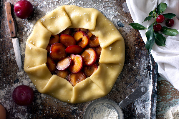 Traditional rustic cake prepared from dough and plum. Ready to be prepared - Фото, зображення