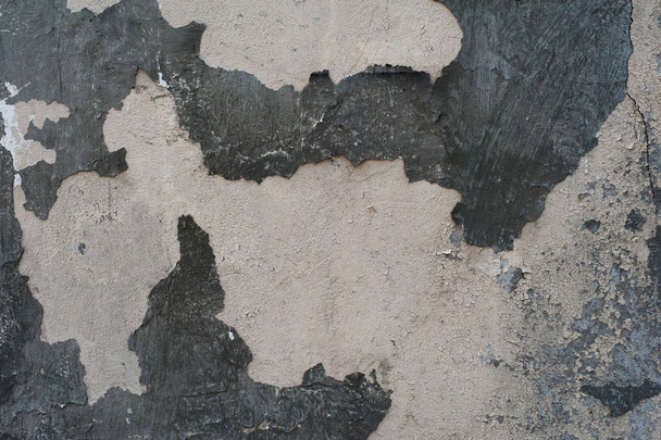 Old wall texture with cracked black paint  - Fotoğraf, Görsel