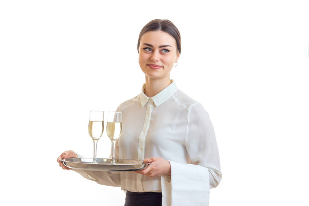 pretty brunette waitress with silver trey in hands - Foto, immagini
