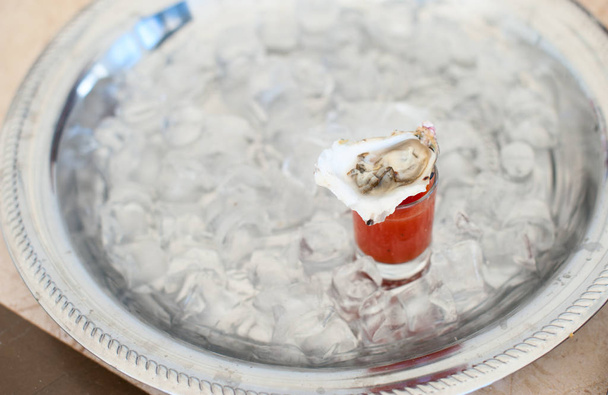 Oysters with bloody Mary cocktail - Photo, Image