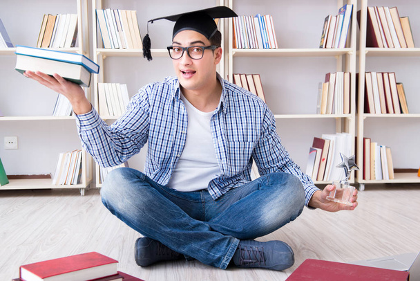 Young student studying with books - Photo, Image