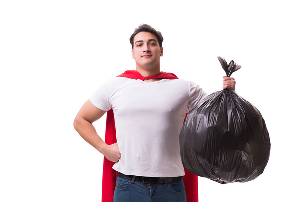白で隔離ゴミ袋とスーパー ヒーローの男 - 写真・画像