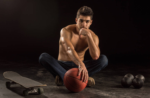 Young man in his 20s representing various recreational sports - Foto, Bild