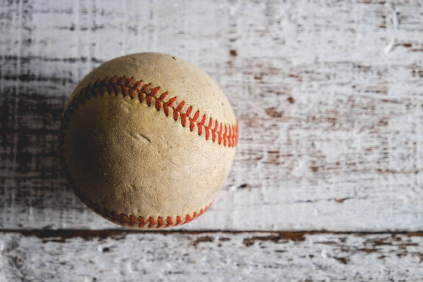 old Baseball and glove on wood background with filter effect retro vintage style - Φωτογραφία, εικόνα