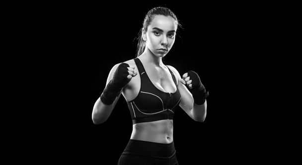 Sportsman muay thai boxer fighting. Isolated on black background. Copy Space. Sport concept. - Φωτογραφία, εικόνα
