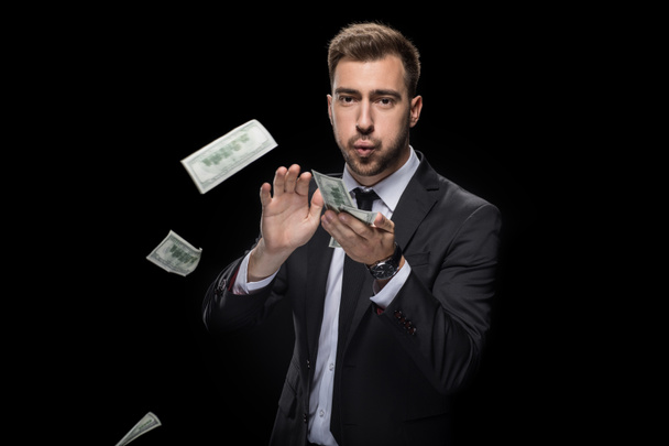 hombre de negocios tirar dinero
 - Foto, Imagen