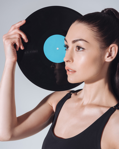 Woman with vinyl record - Photo, image