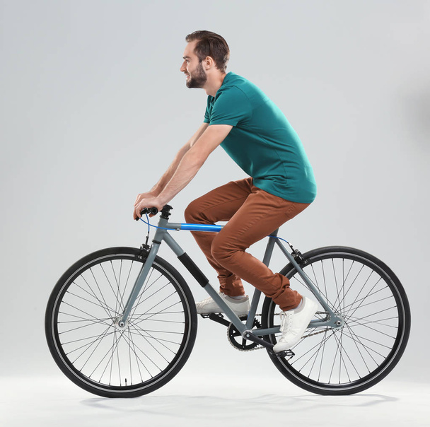 man riding bicycle  - Фото, изображение