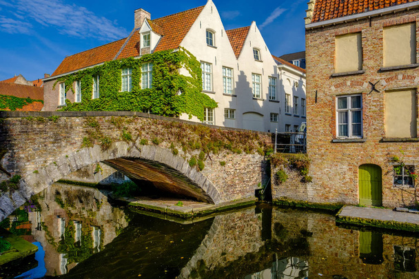 Bruges cityscape with water canal  - Fotó, kép