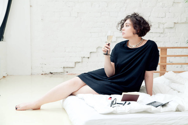 female model with glass of champagne - 写真・画像