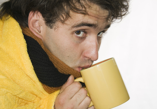 Flu. Influenzal man drinks hot tea - Valokuva, kuva