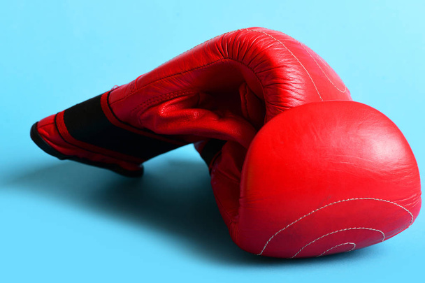 Pair of leather boxing sportswear. Boxing gloves in red color - Fotografie, Obrázek