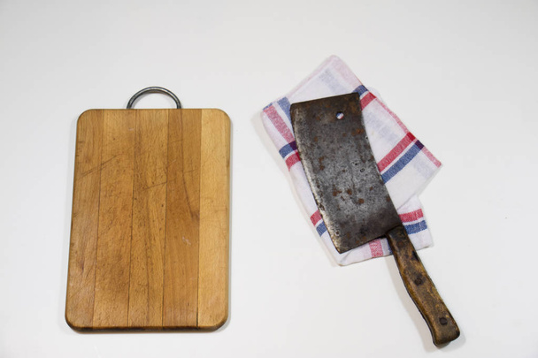 Old chopper and plank on white background, tools for butcher - Фото, зображення
