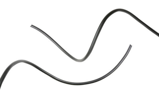 black wire isolated on a white background abstraction. - Photo, Image
