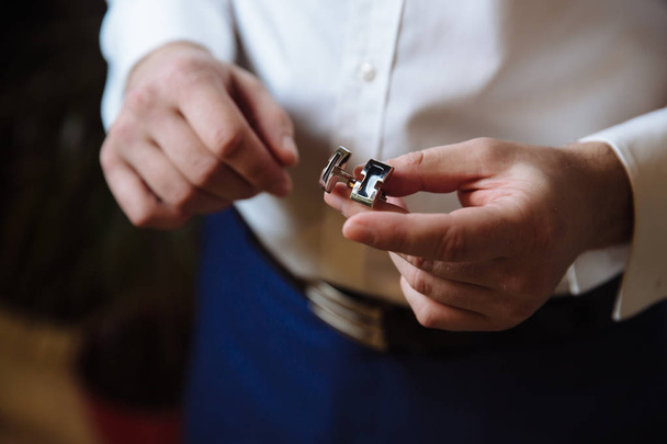 Groom hands with cufflinks. Elegant gentleman clother, white shirt - Photo, Image
