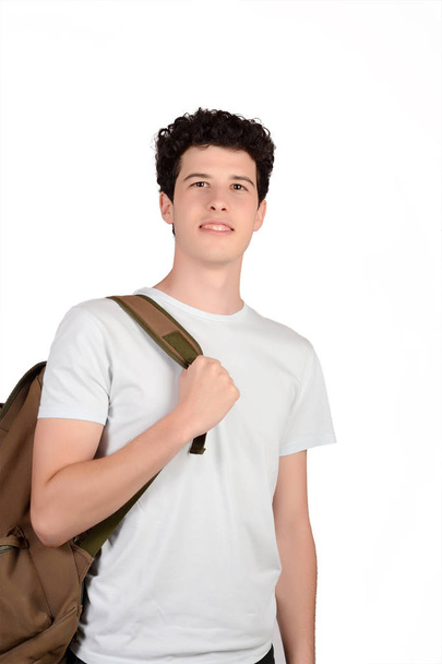Portrait of young latin man with backpack. - Foto, afbeelding