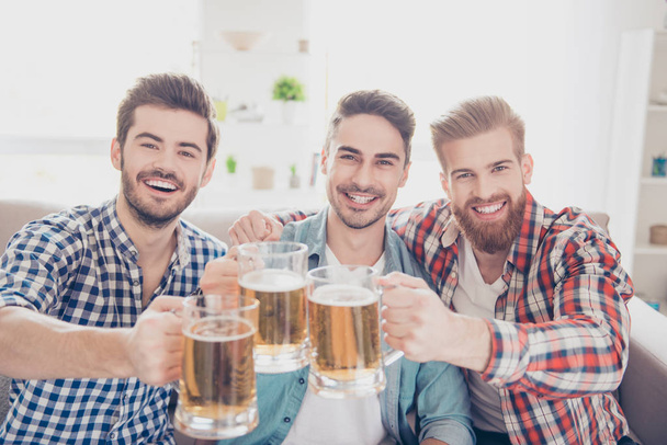 Bachelor men`s life. Cheers! Close up photo of three  happy hand - Фото, зображення