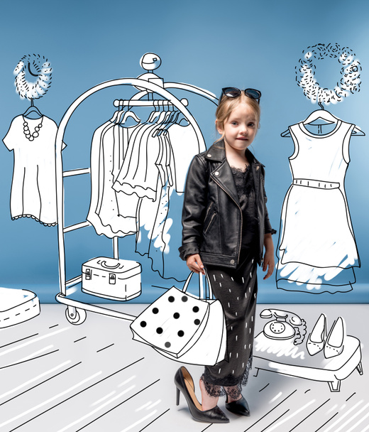 Stylish girl choosing clothes  - Photo, Image