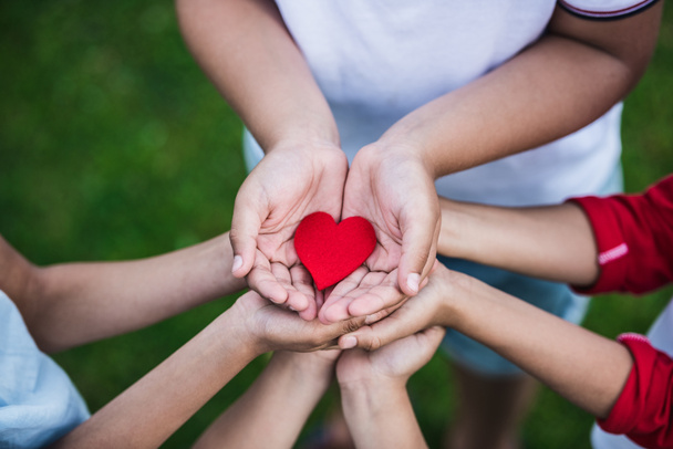 Children holding heart symbol - Photo, Image