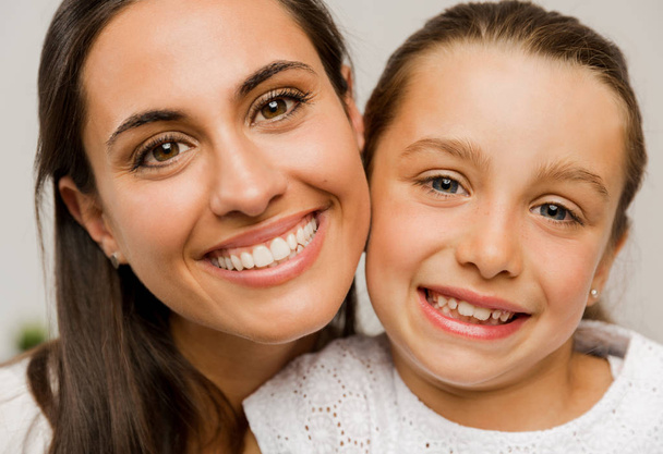 Mother and Daughter smiling  - Photo, image