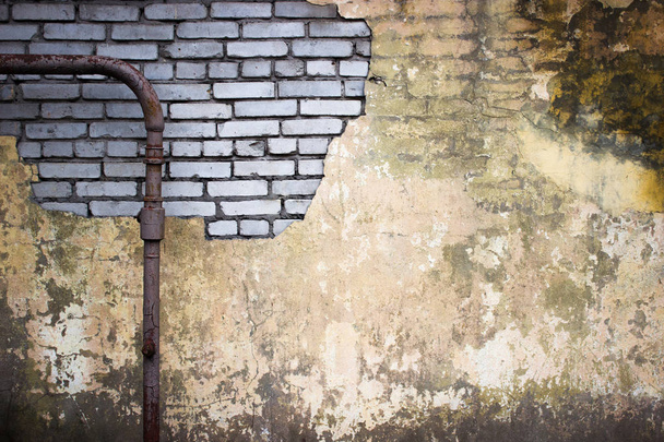 sfondo urbano di un muro di mattoni con stucchi distrutti
 - Foto, immagini