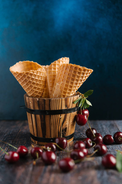 Waffle cones and red cherries - Photo, Image