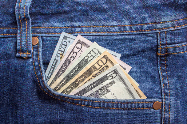 dollar banknotes in jeans pocket closeup. Business concept. pocket money. - Photo, Image
