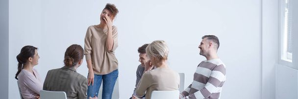 Woman crying during group therapy - Foto, Imagen