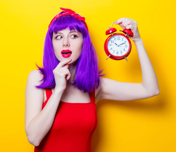 young woman with alarm clock - Photo, Image