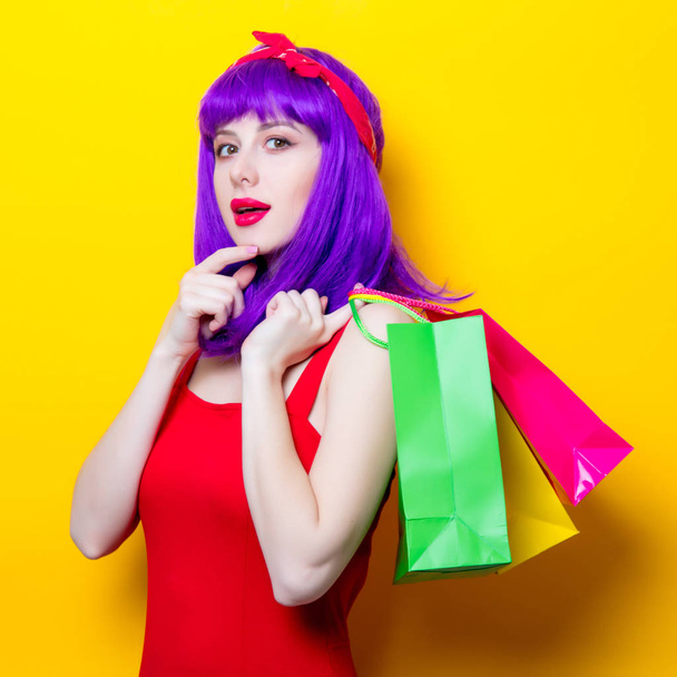 young woman with shopping bags - Foto, immagini