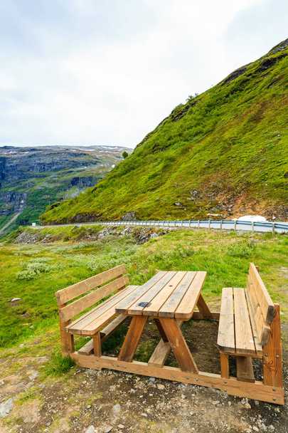 Camp site with picnic table in norwegian mountains - Foto, afbeelding
