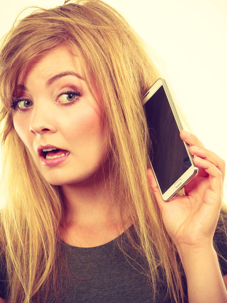 Crazy young woman talking on phone - Fotoğraf, Görsel