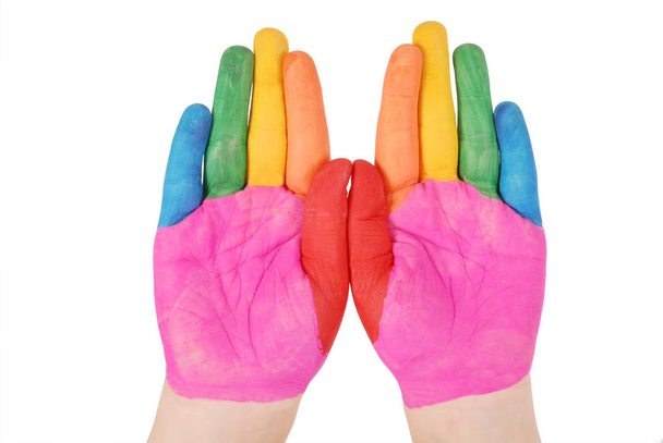 Mãos de criança pintadas em tintas coloridas prontas para impressões manuais
 - Foto, Imagem