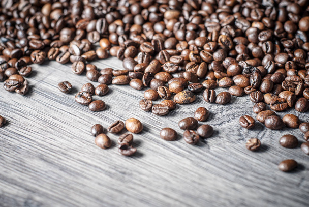 Coffee beans concept on wooden table background. - Photo, Image