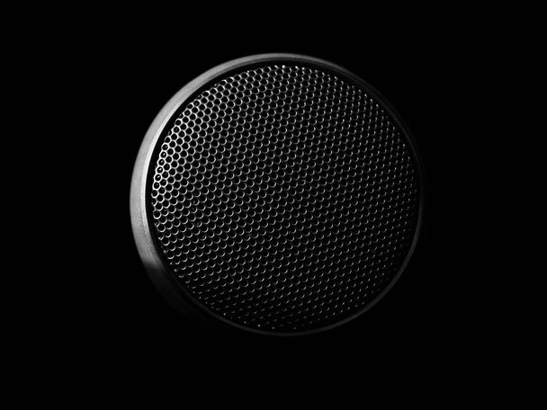 close-up shot of bluetooth speaker on black - 写真・画像