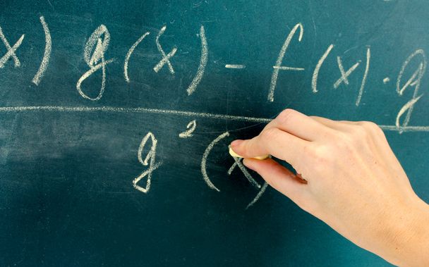 Math formula written on blackboard with chalk. - Zdjęcie, obraz