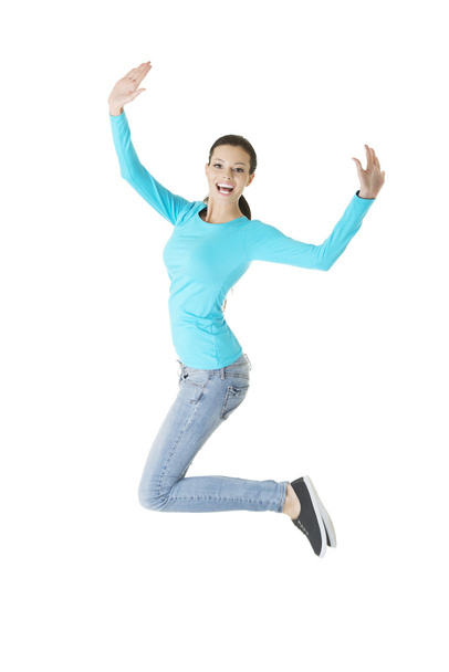 Jumping happy young woman - Zdjęcie, obraz