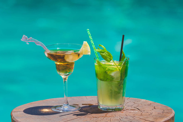 Cocktails at poolside - Фото, изображение