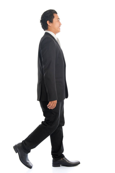 Side view Asian business man walking - Foto, Imagem