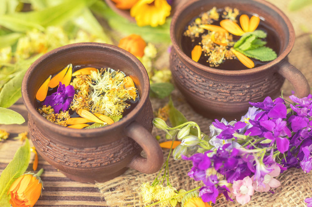 Ceramic cups of healthy herbal tea - Photo, Image
