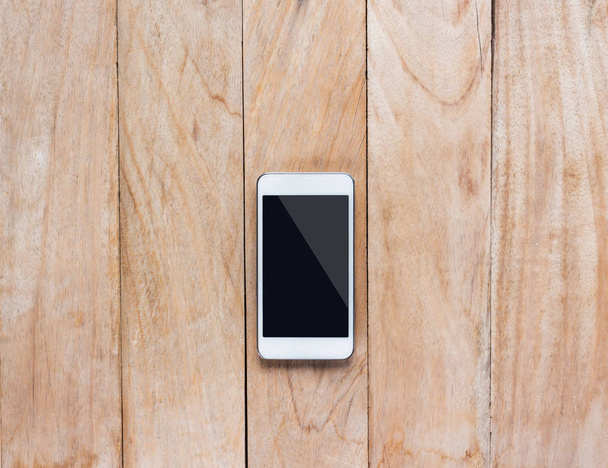 Telefone celular em madeira
 - Foto, Imagem
